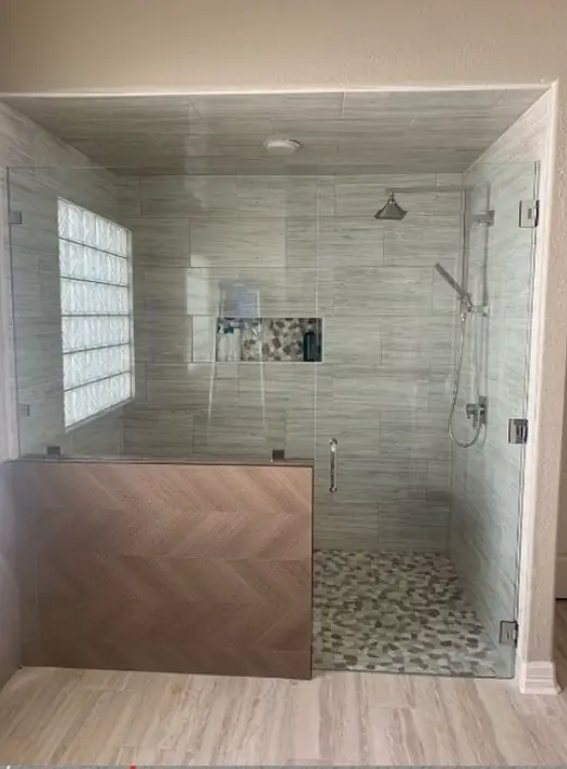Walk-in shower with glass block wall