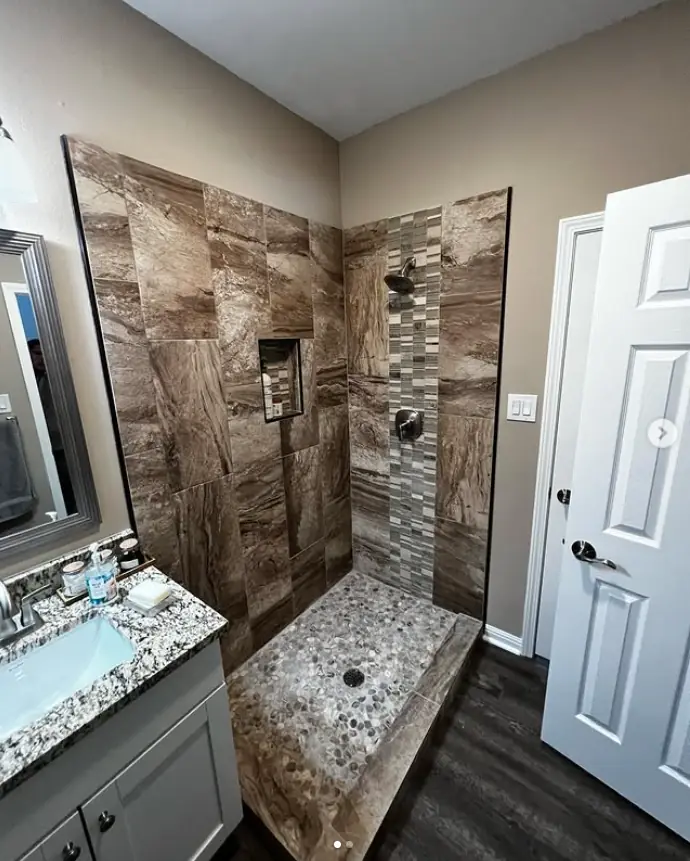 Shower enclosure and vanity mirror
